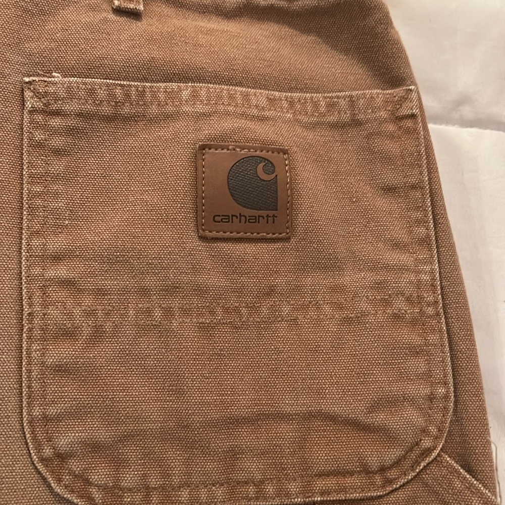 In great shape a pair of Carhart Cotton Duck loose fit carpenter pants